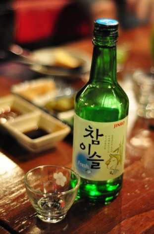 Soju is one of the most popular and potent alcoholic drinks in Seoul, and is commonly used for toasts and to accompany meals in the evening.  Attribution: Graham Hills