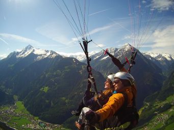 A spectacular view of the mountains as AYA student, Meghan Flanagan paraglides with a guide..JPG